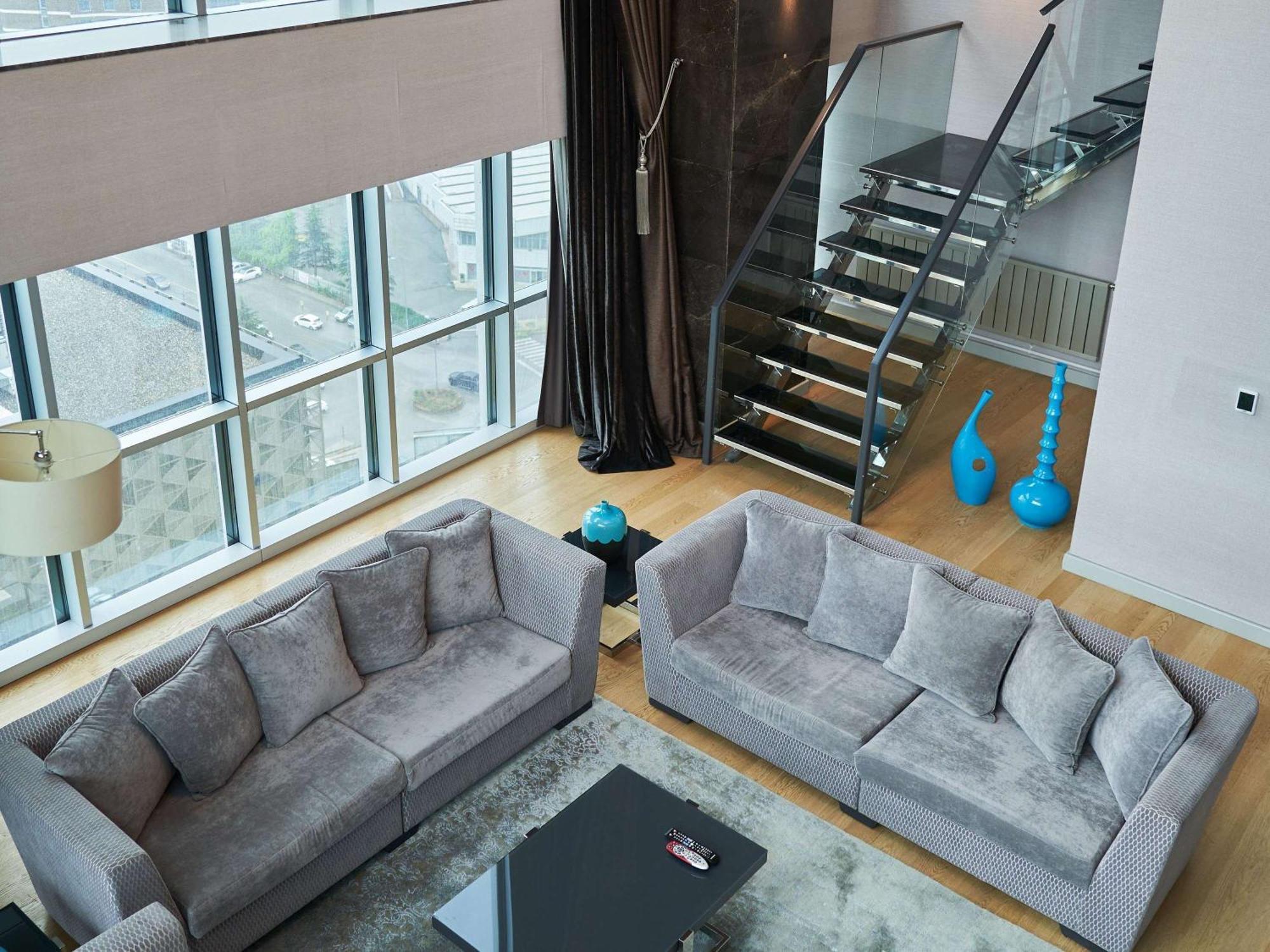 อนาโดลู โฮเต็ล ดาวน์ทาวน์ อังการา Hotel ภายนอก รูปภาพ A living room in a duplex apartment